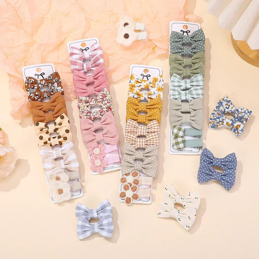 Bébé arcs 20 pièces/ensemble tissu fait à la main imprimé Barrette Boutique Mini Boutique frange arc
