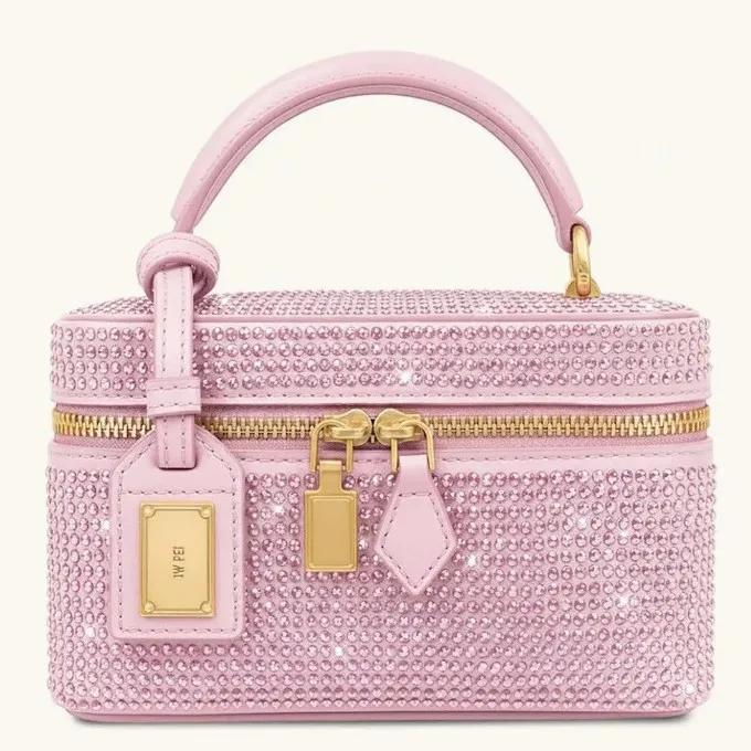 Sac bandoulière de luxe pour femme en cuir texturé avec logo lettre, également un élégant sac à lang