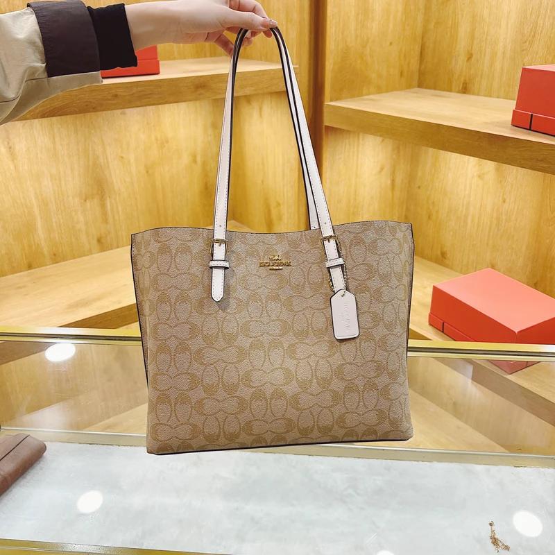 Sac à langer bandoulière tendance en cuir haut de gamme, style classique de créateur, décontracté, s