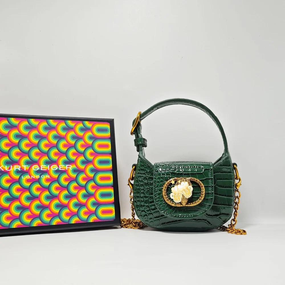 Sac bandoulière polyvalent 2026 pour femme, nouveau modèle, mini sac à chaîne contrastant, style env
