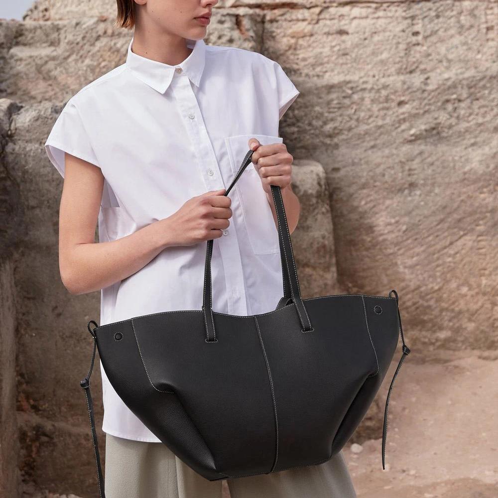 Sac à bandoulière Alirattan 2026 en cuir grande capacité, nouveau design tendance en forme de dumpli