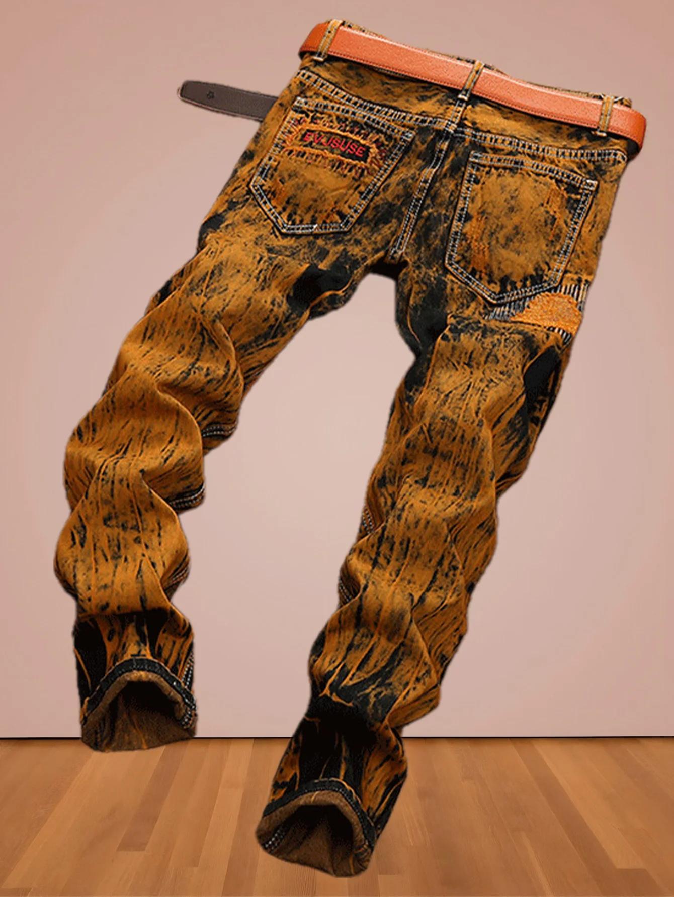 La personnalité du trou pop de la jeunesse américaine fabrique des vieux jeans droits pour hommes.