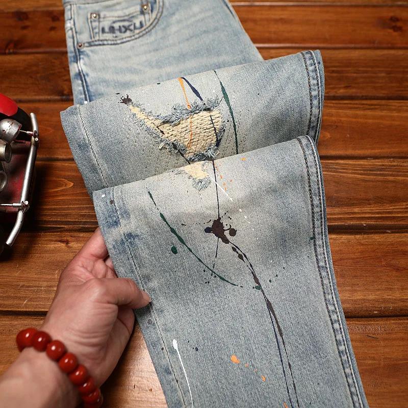 Jean déchiré pour hommes, coupe slim avec petits pieds, imprimé d'encre éclaboussée, pantalon à la m