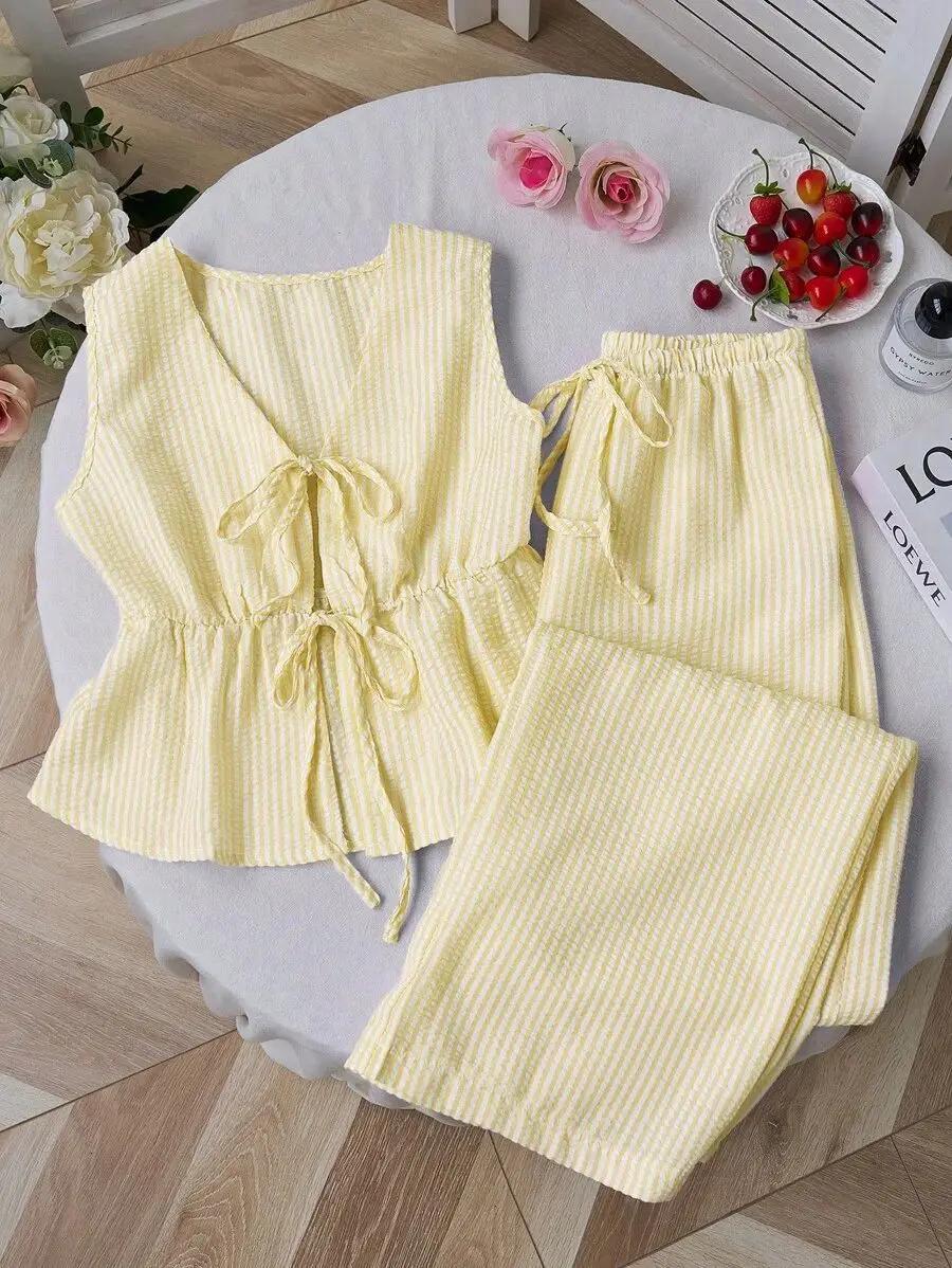 Ensemble deux pièces été 2026 pour femme : Blouse rayée sans manches à col en V et lacets, pantalon 