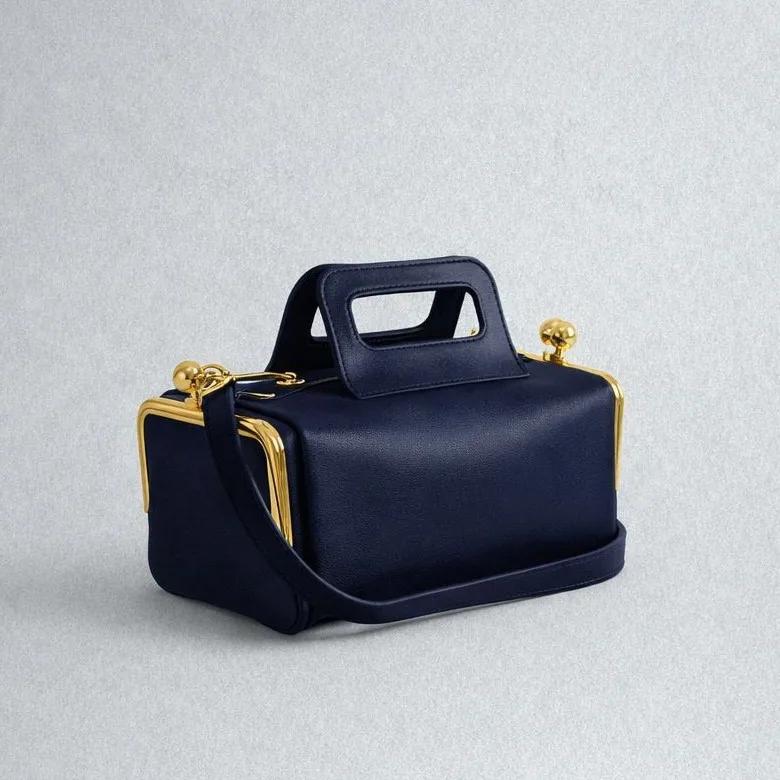 Sac de voyage élégant de couleur unie, sac de luxe de grande capacité en cuir, sacs à couches pour f