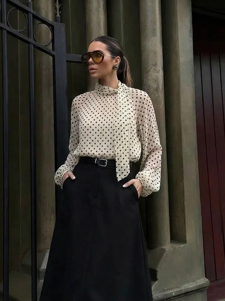 Chemisier à pois tendance 2026 pour femme HH, col à nœud, manches longues, style chic et fin pour fe