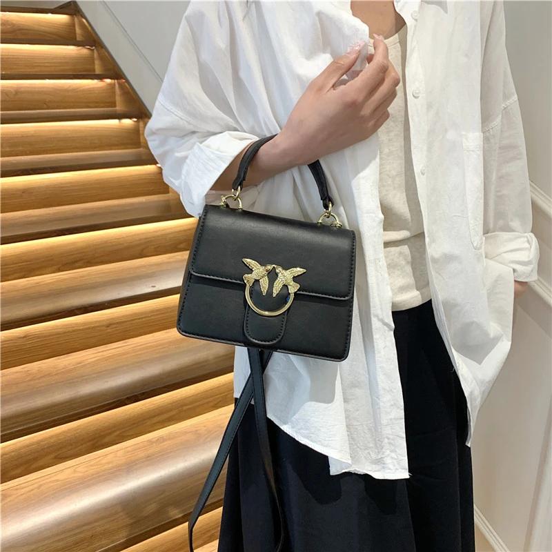 Sac à langer de luxe stable avec un design bien structuré qui conserve sa forme même lorsqu'il est e