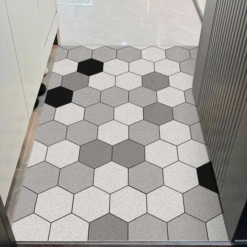 Le tapis de porte d'entrée peut être nettoyé avec un tapis de porte domestique en PVC. Le tapis d'entrée est un tapis de dessin animé résistant à la saleté