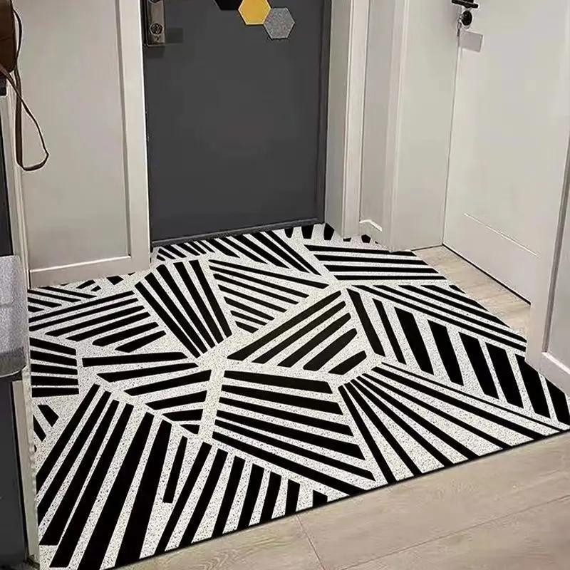 Le tapis de porte d'entrée peut être nettoyé avec un tapis de porte domestique en PVC. Le tapis d'entrée est un tapis de dessin animé résistant à la saleté