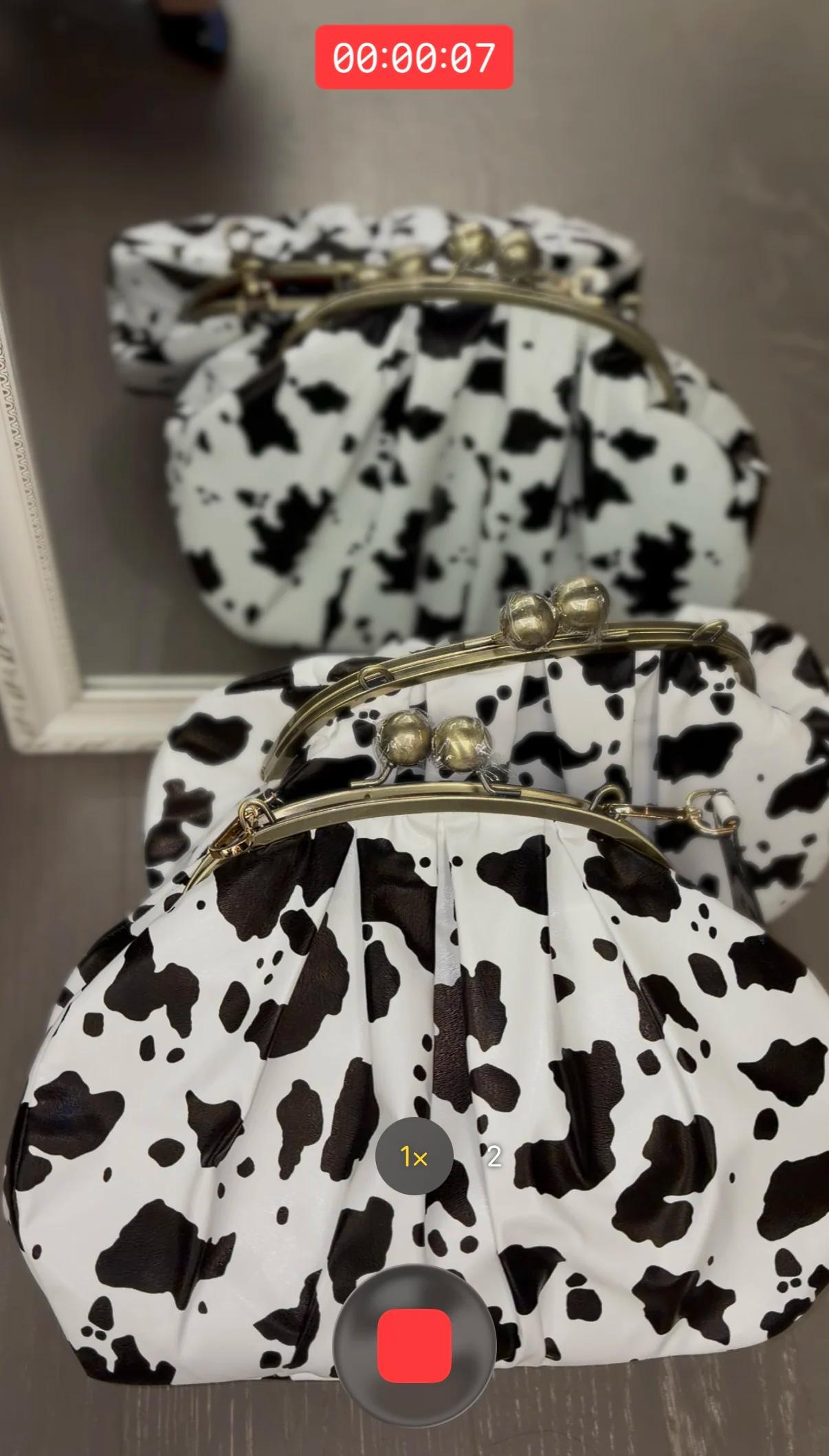 LOST IN VINTAGE – pochette en tissu à motif de vache