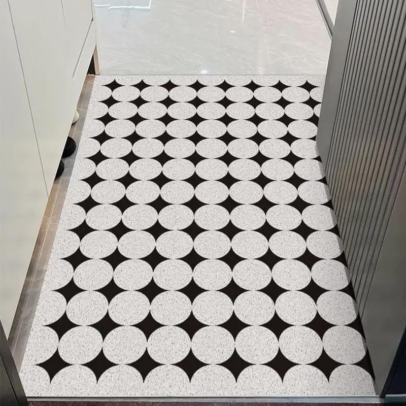 Le tapis de porte d'entrée peut être nettoyé avec un tapis de porte domestique en PVC. Le tapis d'entrée est un tapis de dessin animé résistant à la saleté