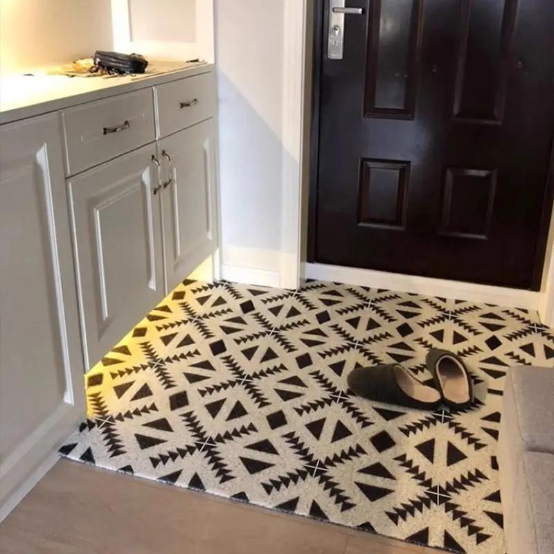 Le tapis de porte d'entrée peut être nettoyé avec un tapis de porte domestique en PVC. Le tapis d'entrée est un tapis de dessin animé résistant à la saleté