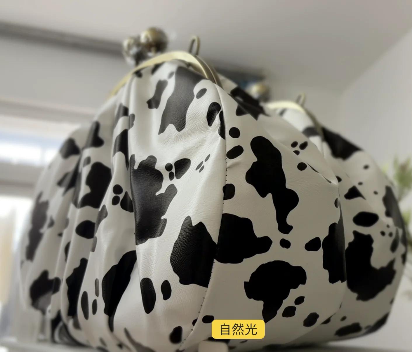 LOST IN VINTAGE – pochette en tissu à motif de vache