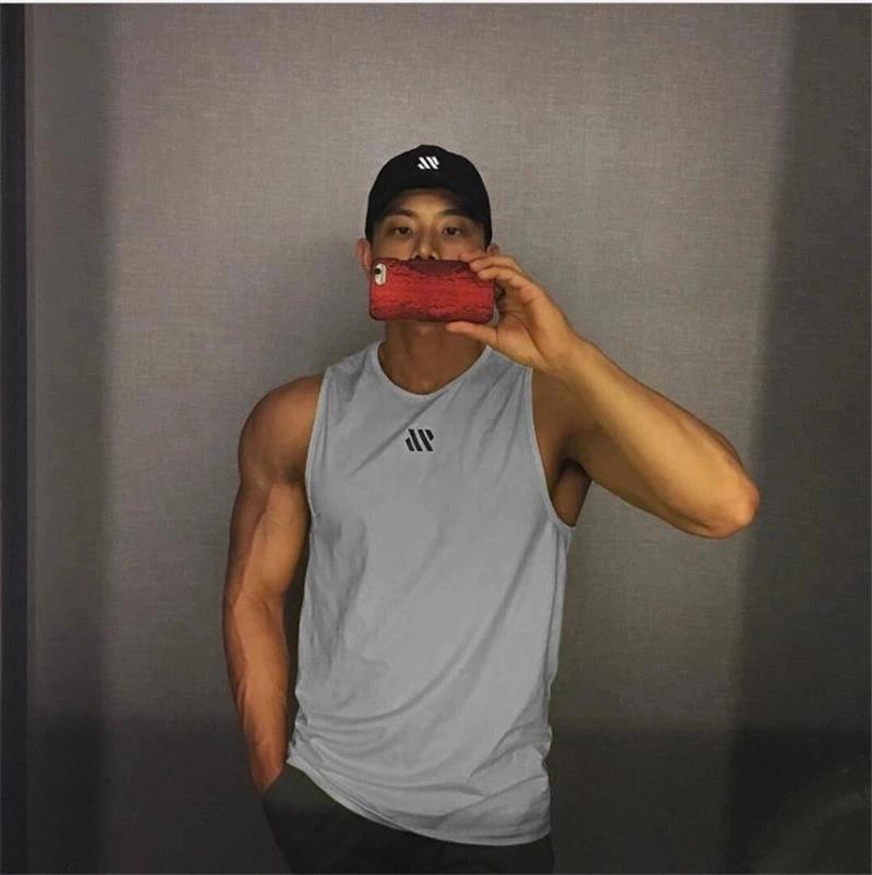 2024 Hommes fitness gymnases Débardeur hommes Fitness chemise sans manches Mâle maille respirant Gil