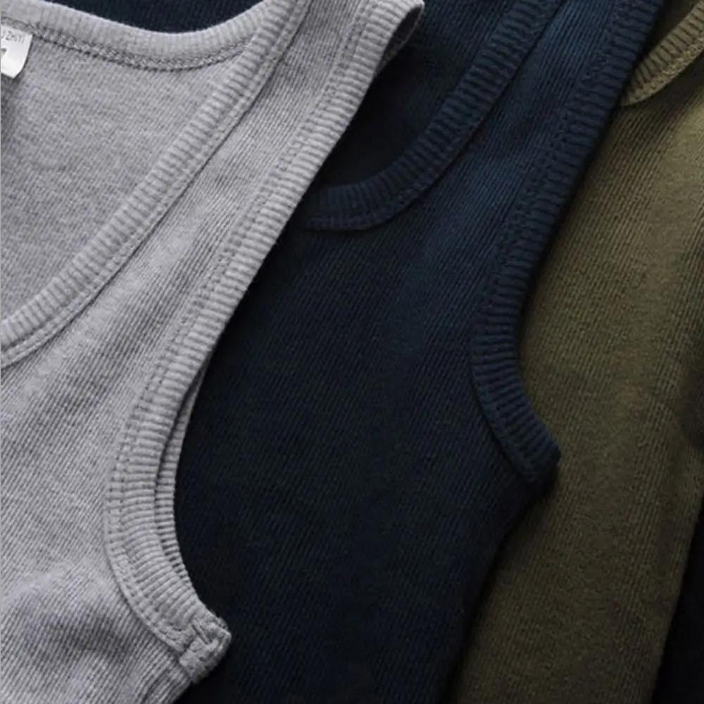 Été chaud grande taille hommes vêtements débardeurs 100% pur coton sans manches Fitness T-shirt élas