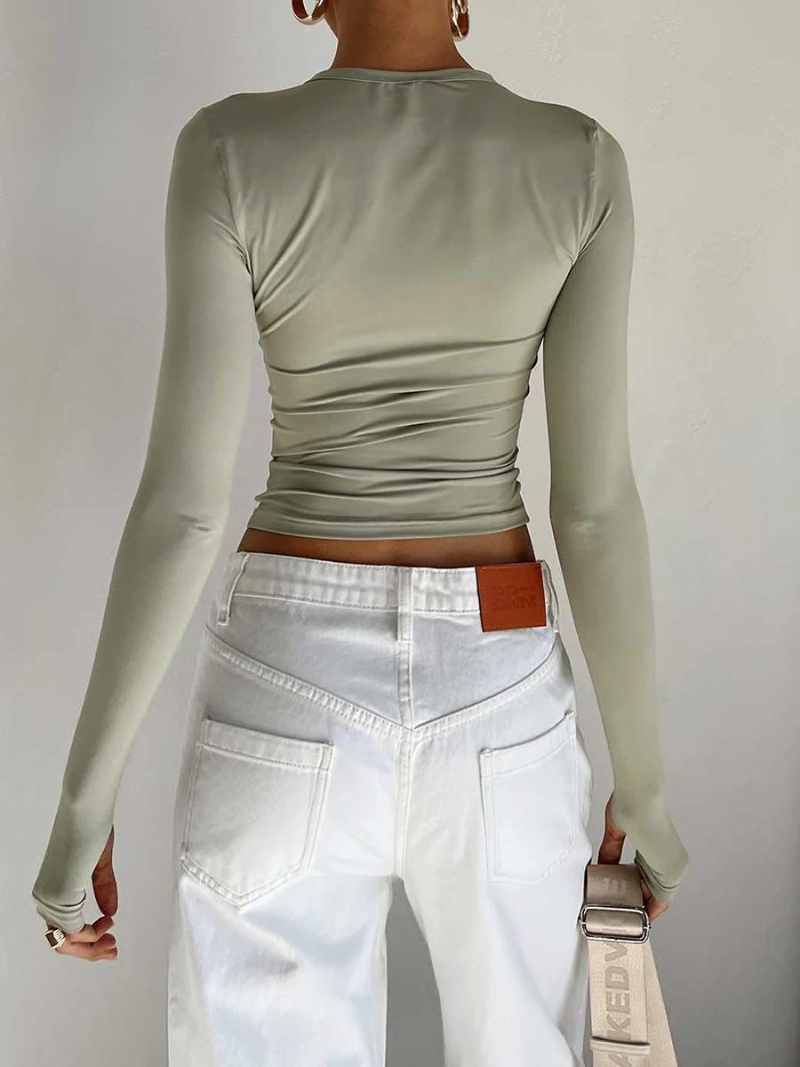 Mode femmes T-shirt à manches longues col rond solide coupe ajustée dames haut court avec trous pour