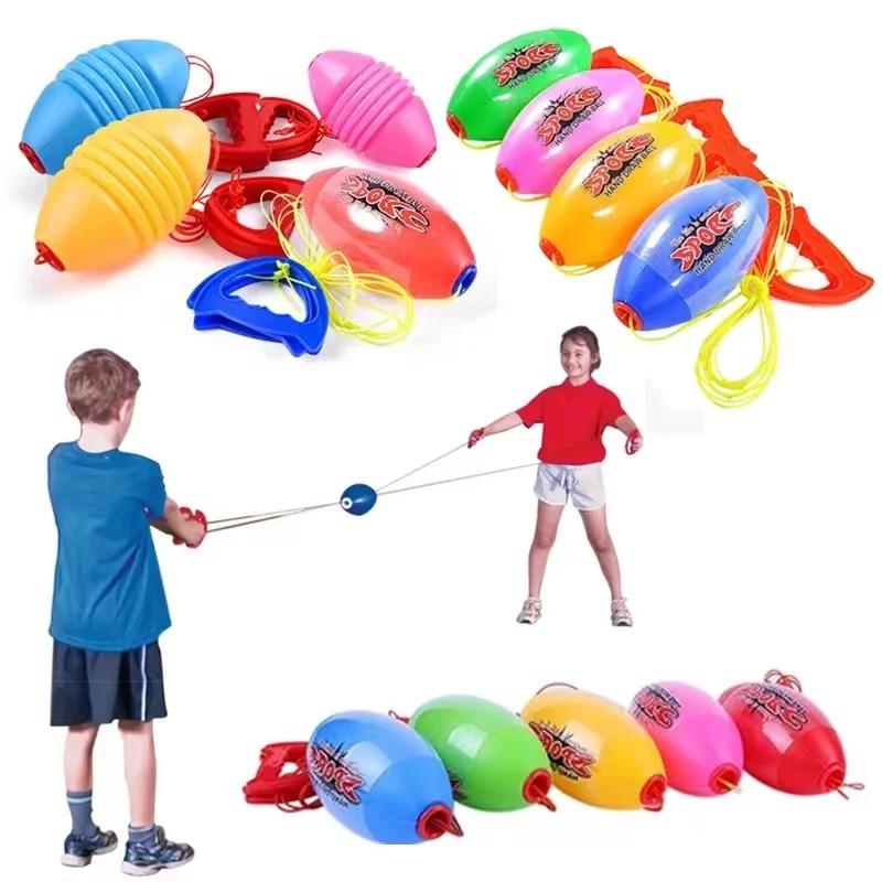 Balle tirée à la main, force de traction à travers l'élasticité, navette rapide, entraînement de la