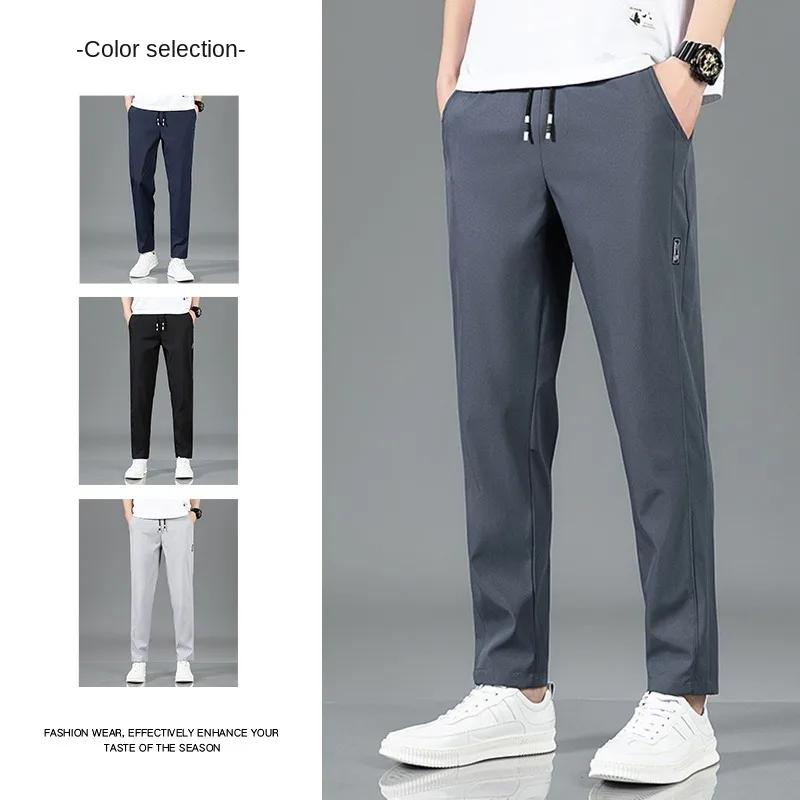 Pantalons pour hommes en soie glacée 2025 été nouveau noir gris mince pantalons décontractés d'affai