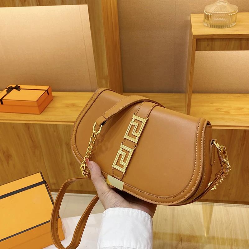 Sac à langer en cuir souple et tendance avec bandoulière réglable, réduit la fatigue lors du transpo