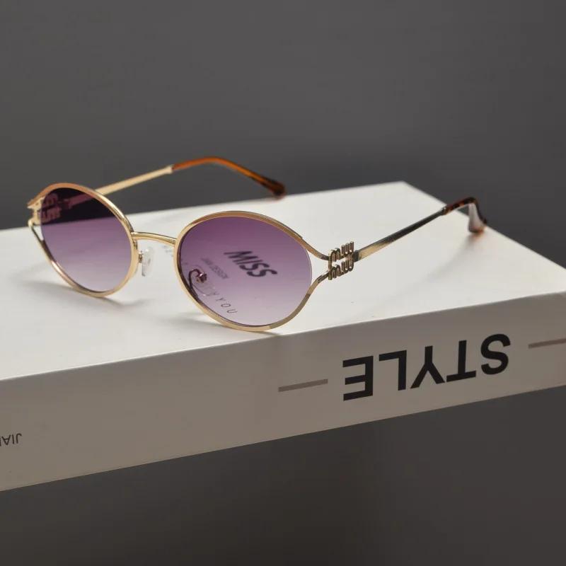 Nouvelle marque de mode lunettes de soleil ovales pour femmes rétro petit cadre femme homme métal lu