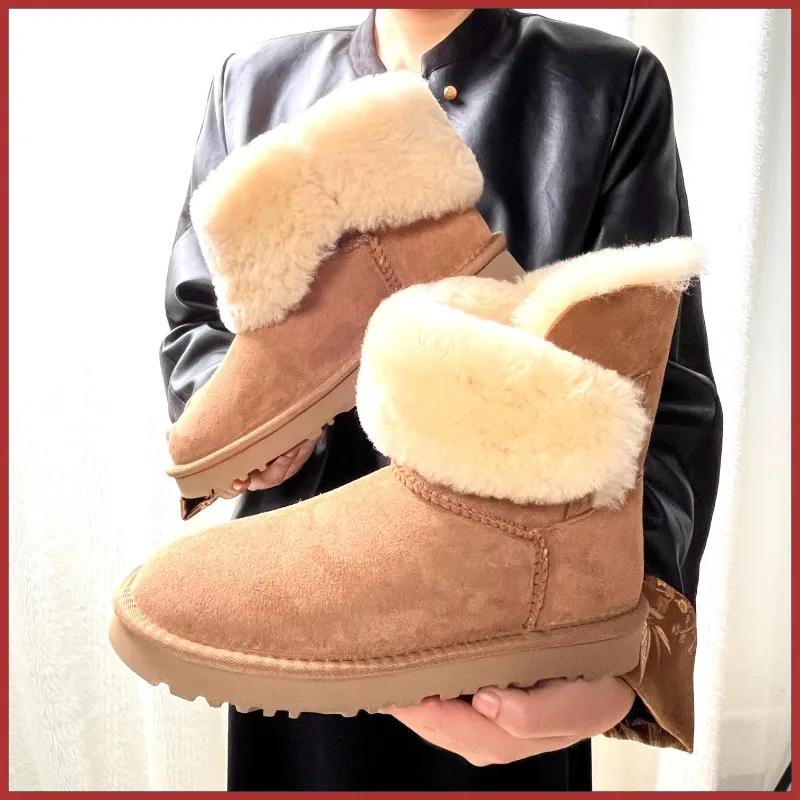 Une paire de bottes de neige en pure peau de mouton et laine pour femme