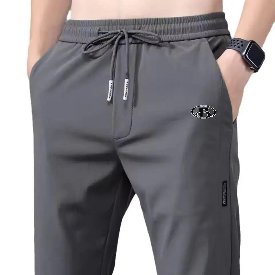Pantalons pour hommes en soie glacée 2025 été nouveau noir gris mince