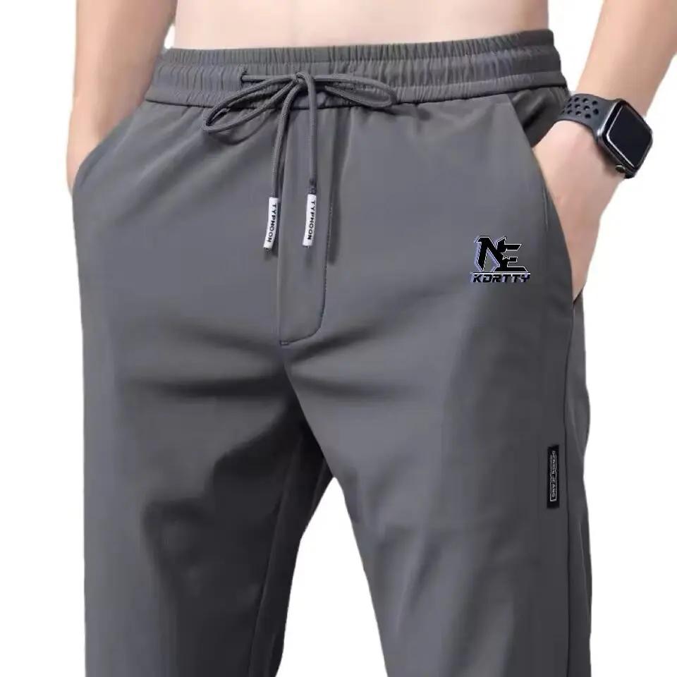 Pantalons pour hommes en soie glacée 2025 été nouveau noir gris mince