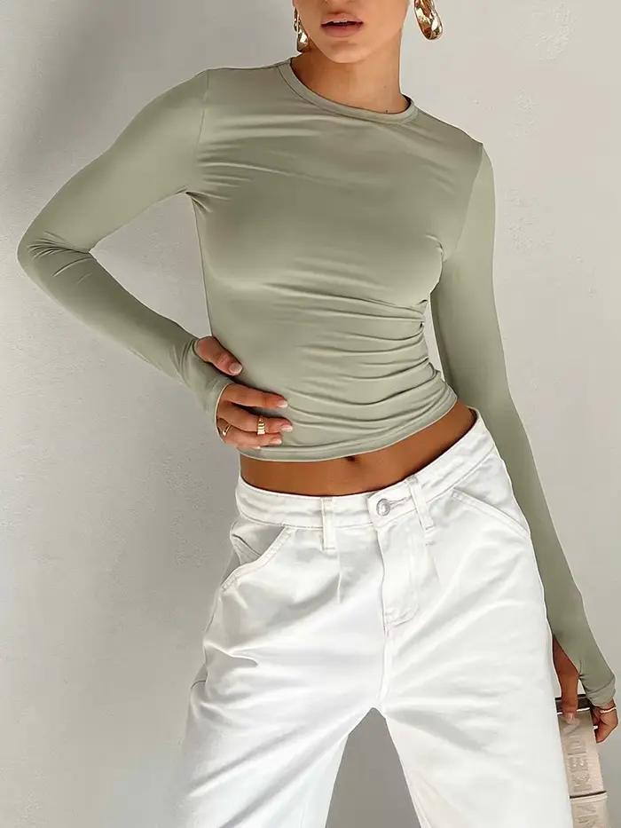 Mode femmes T-shirt à manches longues col rond solide coupe ajustée dames haut court avec trous pour