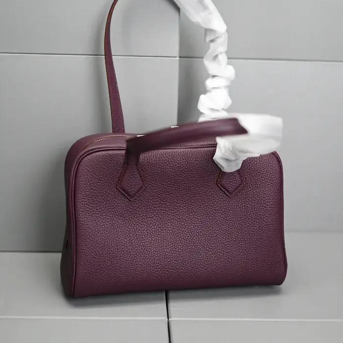 Sac à main en cuir véritable pour femme, couche supérieure, sensation avancée, nouveau modèle à la m