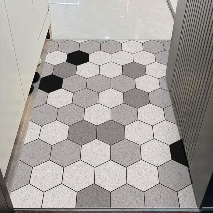 Le tapis de porte d'entrée peut être nettoyé avec un tapis de porte domestique en PVC. Le tapis d'en