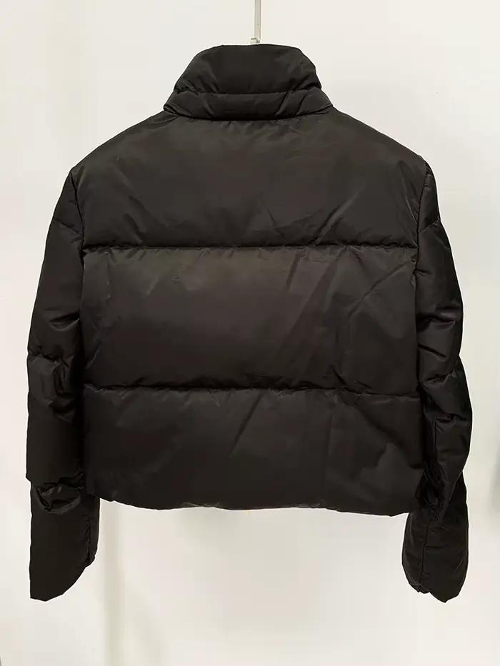HIGH STREET Nouveauté 2026 Manteau de créateur Femme Coupe ajustée Doudoune blanche ornée de plumes
