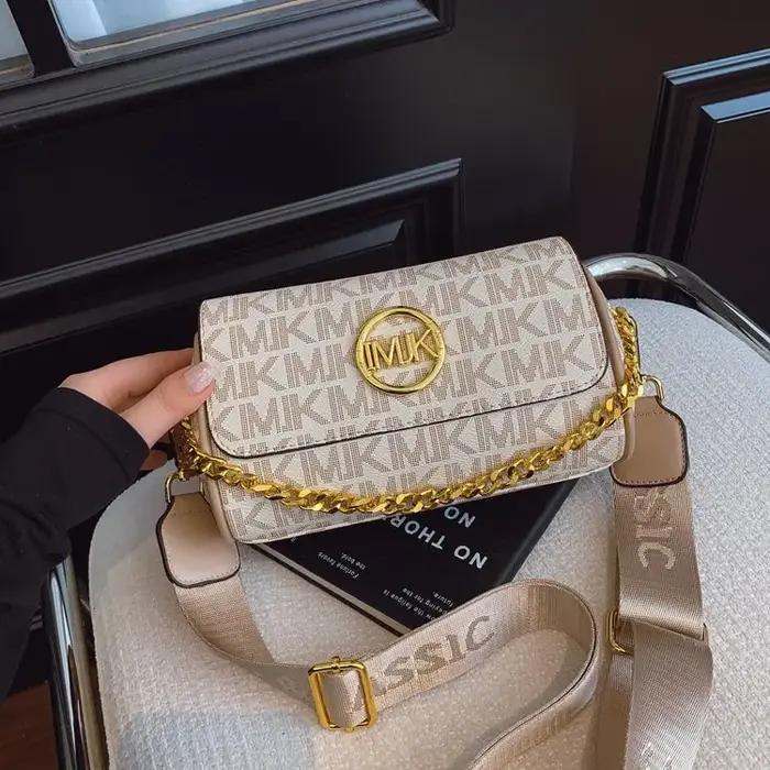 Sac à langer élégant en cuir classique populaire pour femmes, grande capacité, texturé, style rétro