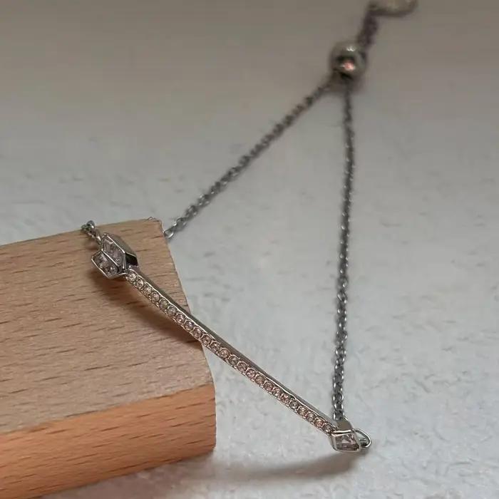 Nouvel ensemble de bijoux raffinés 2026 : Boucles d'oreilles flèche en or et cristal, collier, boucl