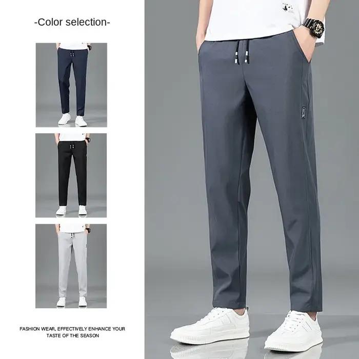 Pantalons pour hommes en soie glacée 2025 été nouveau noir gris mince pantalons décontractés d'affai