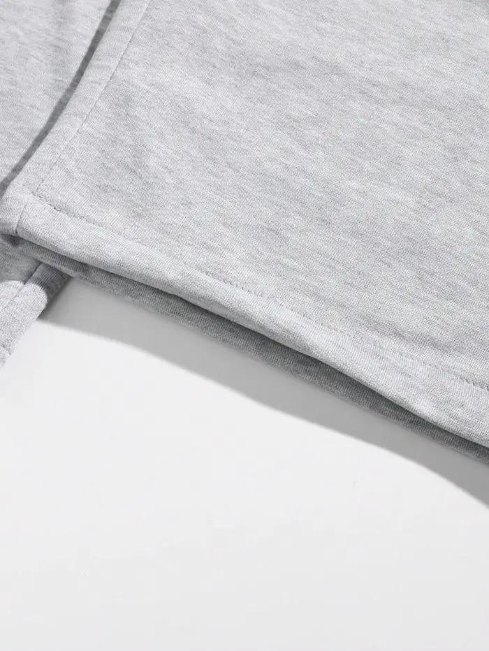 Shorts amples décontractés pour hommes, couleur unie, avec poches obliques, style estival élégant et