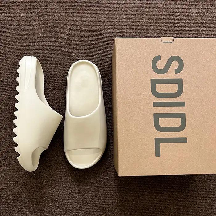 Sandales YZY d'été 2026 pour hommes et femmes – Claquettes originales décontractées en EVA pour la p