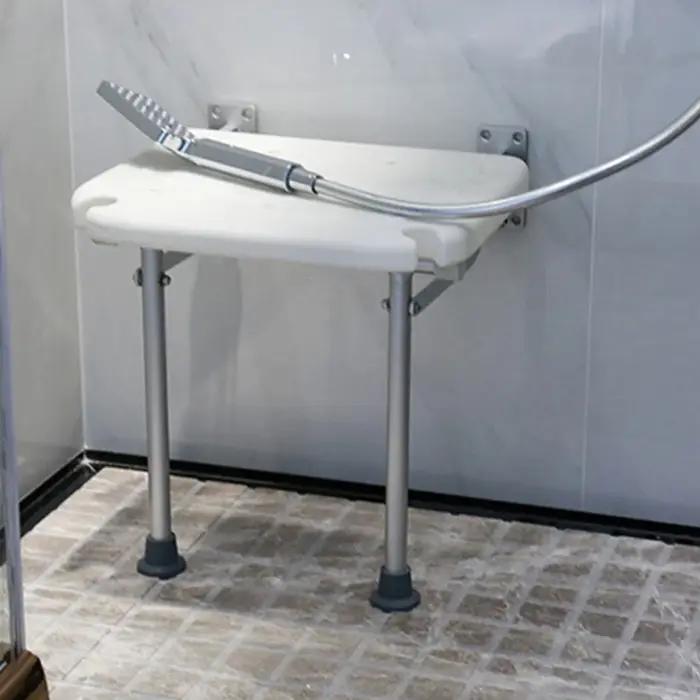 Banc de douche pliant avec pieds antidérapants et fente de pomme de douche pour une utilisation sûre et élégante dans la salle de bains occasions spéciales