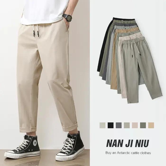 Pantalon décontracté pour homme en coton respirant, couleur unie gris kaki, idéal pour le printemps