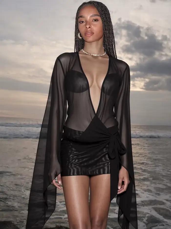 Kliou maille irrégulière femmes Mini robe Sexy voir à travers Chic à manches longues col bas profond