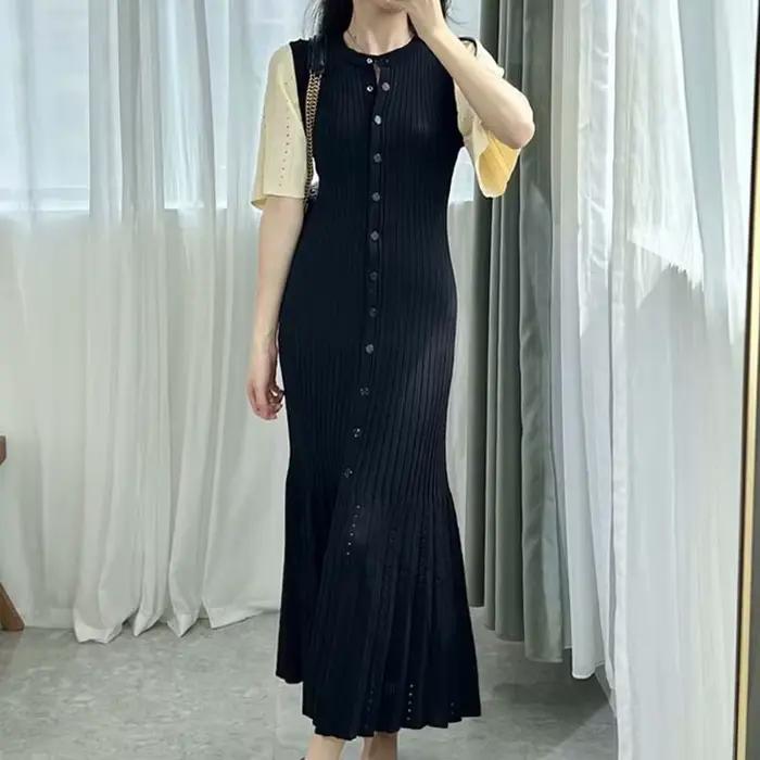 Robe tricotée française ajourée à la mode, style d'été, amincissante, ligne a, manches courtes, robe
