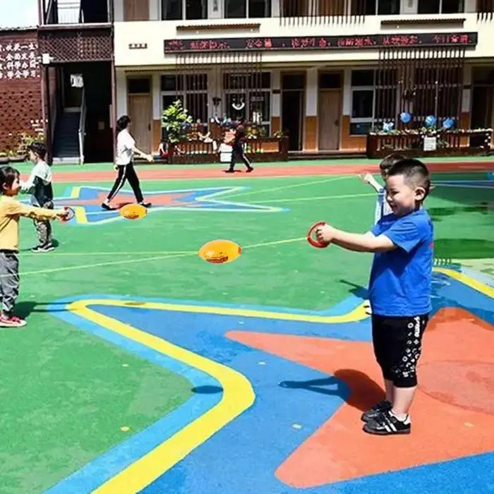 Balle tirée à la main, force de traction à travers l'élasticité, navette rapide, entraînement de la